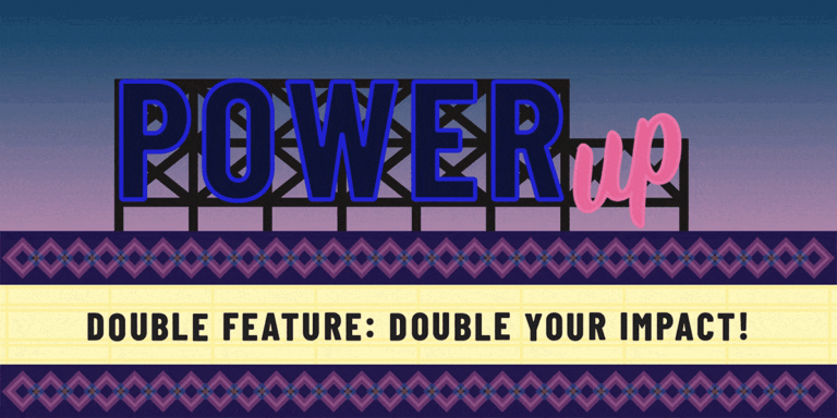 Blue, purple, and pink neon sign that says Power Up above a building.