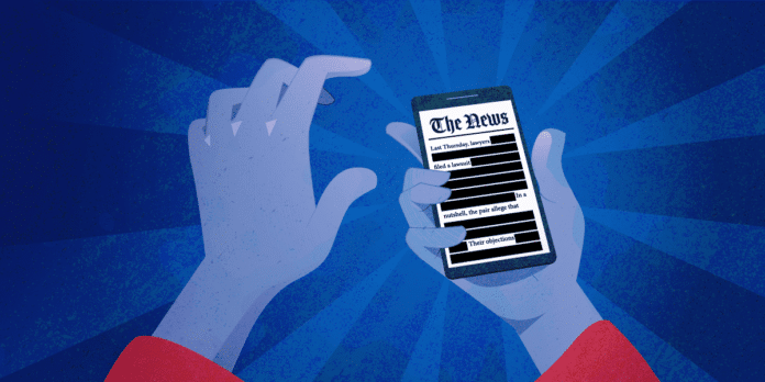 hands holding a phone showing a heavily censored news article