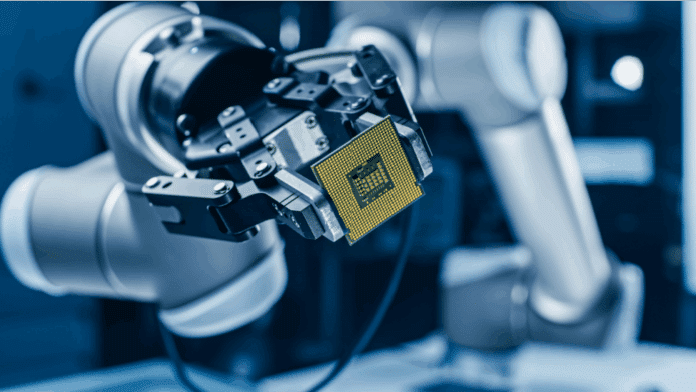 chip being held by robotic arm