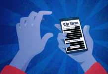 EFF Condena la Inspección del Hogar de un Reportero del Washington Post por el FBI hands holding a phone showing a heavily censored news article
