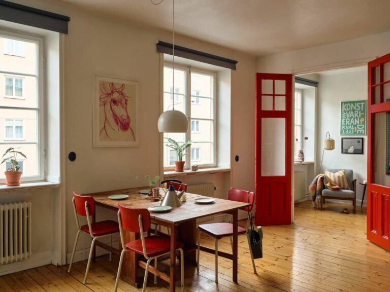 Decoración Vintage en Rojo: Un Piso Escandinavo con Color y Personalidad